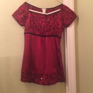 Red and black sequined short sleeve shirt.